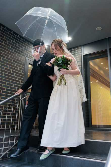 An intimate elopement among the ivy-covered ruins of St Dunstan in the East. Fashion-forward, documentary-style destination wedding photography.