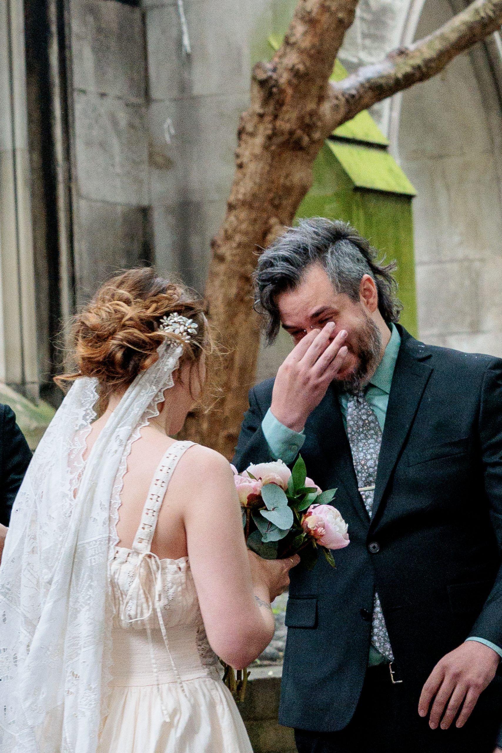 An intimate elopement among the ivy-covered ruins of St Dunstan in the East. Fashion-forward, documentary-style destination wedding photography.